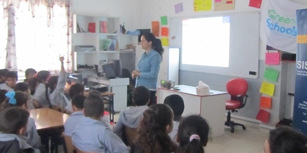 SISSAF Renewable Energy Expert Petra Georges Saab speaking at a school in Lebanon to promote energy saving